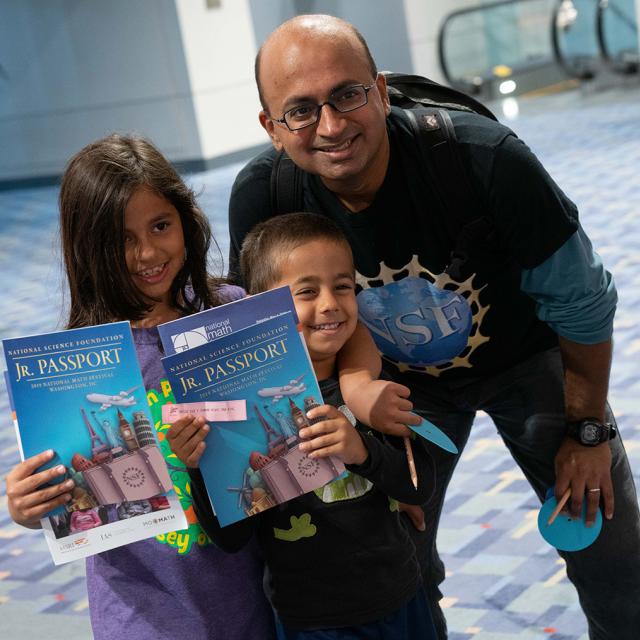 2019 festival attendees holding event passports