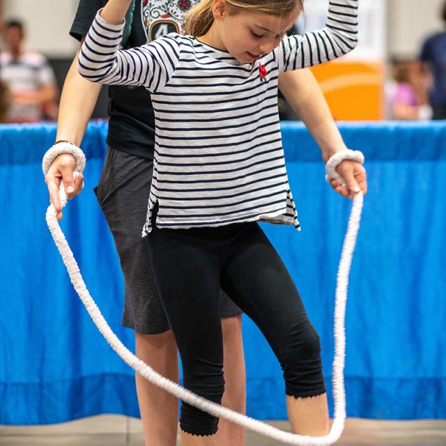 girl playing with ropes at 2019 Festival