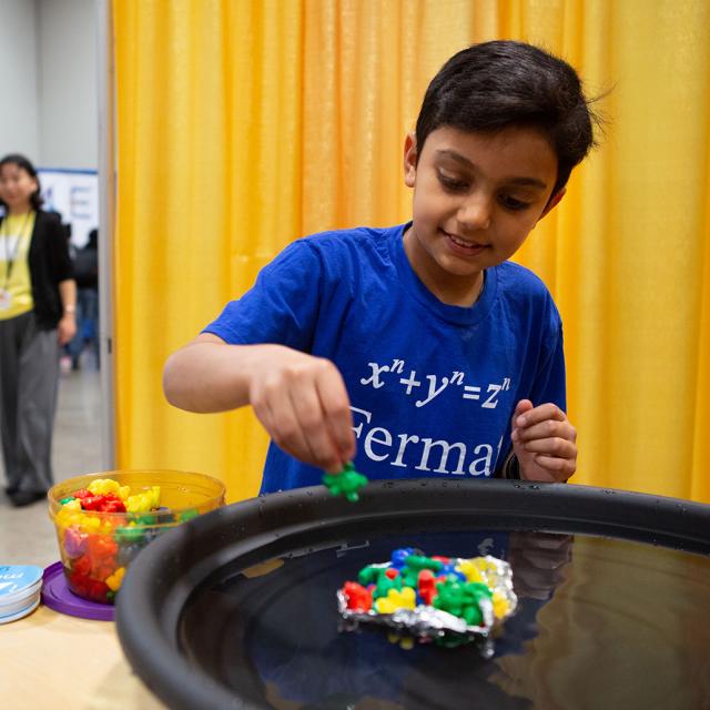 Boy experimenting with buoyancy at 2019 festival