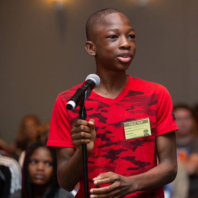 Boy at Microphone - National Math Festival 2019