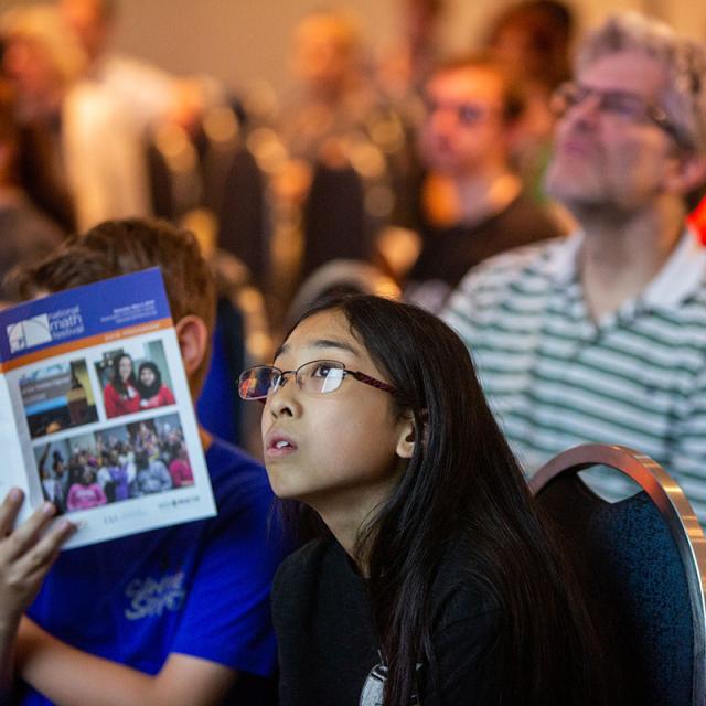 Girl in audience at National Math Festival 2019