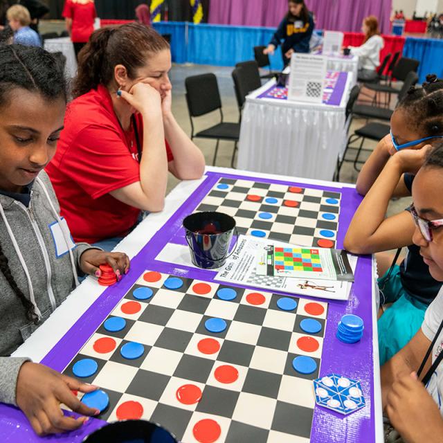 2019 Festival attendees focused on tabletop games